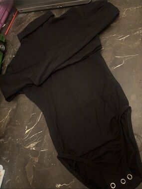 Varsity Black Zip-back bodysuit.